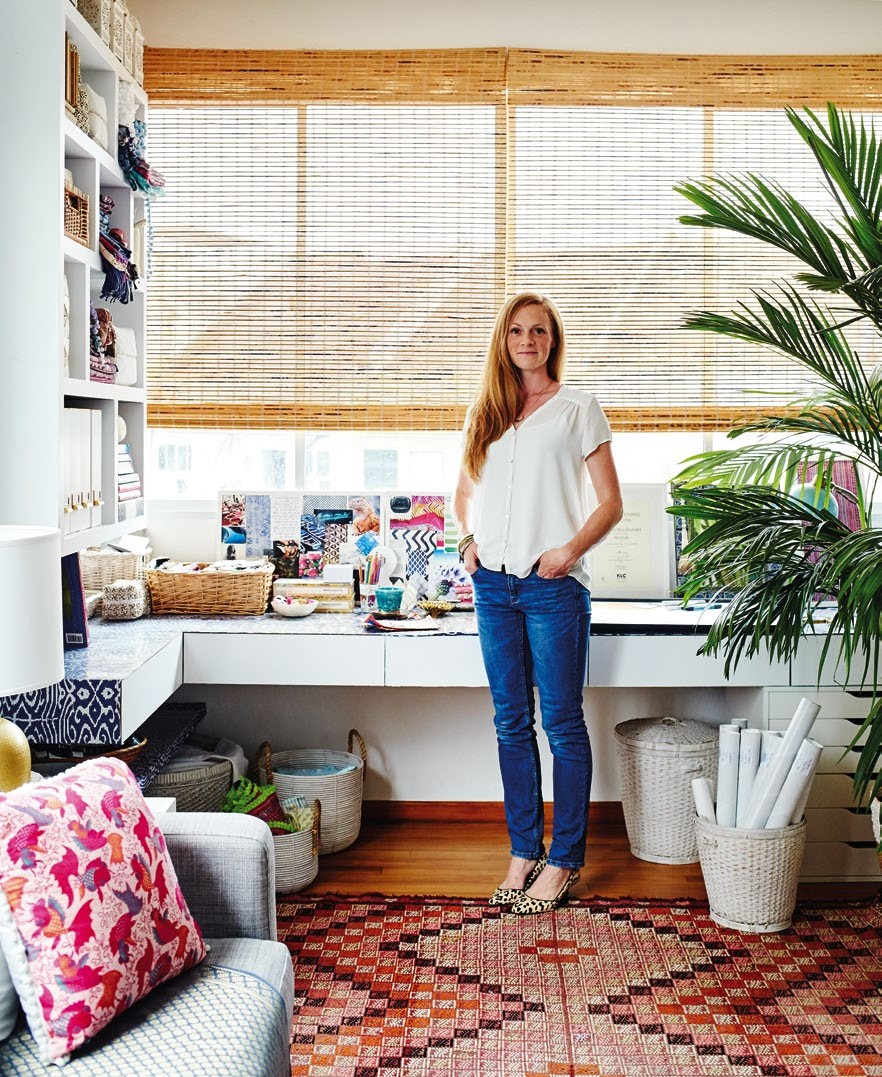 Elly in her colourful
design studio. The
rug is a beautiful
vintage kilim from
Turkey – kilims
are great for the 
tropics as they are 
ﬂatweaves, and so
feel cool underfoot.