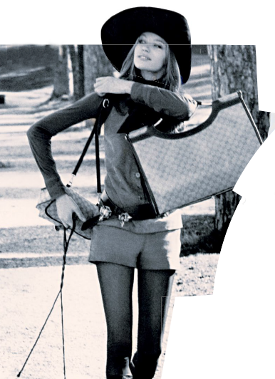 Veruschka on a stroll in Rome with dogs and bags in tow.