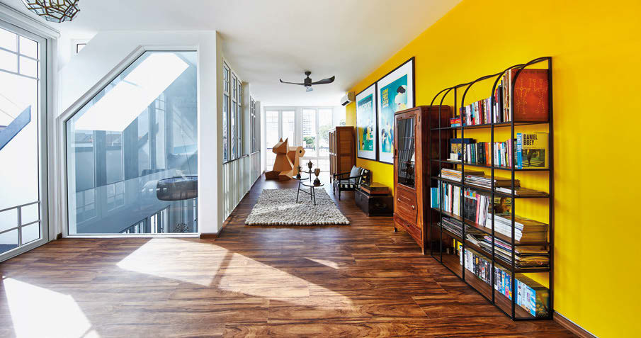 The third and top level of the house is flooded with light – illuminating the fabulous yellow walls. When the windows are open, a breeze circulates through this space.