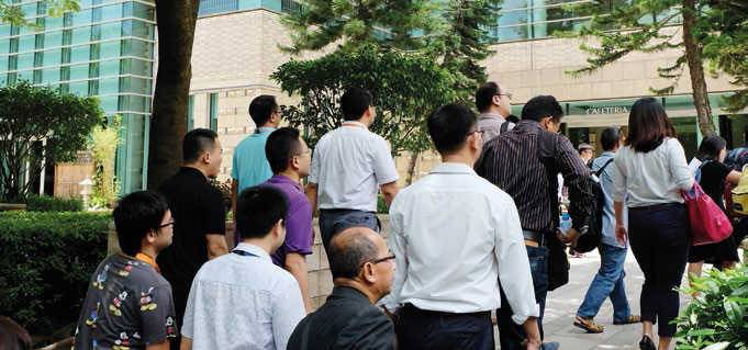 4. Young and talented employees make their way to lunch in hordes.