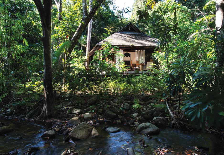 THIS PAGE: The Beach Collection villas have their own private pools; The Datai Spa is set along a quiet stream. OPPOSITE PAGE: The resort is surrounded by pristine rainforest