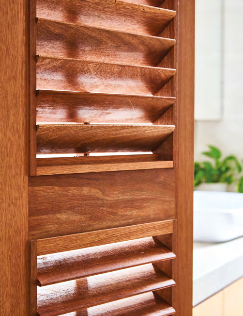 The louvred doors help to keep the bathroom well-ventilated at all times. 