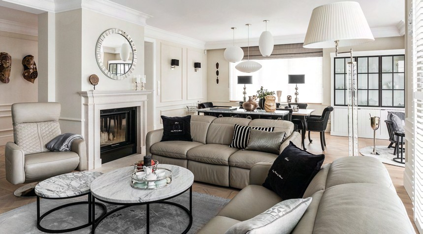 The neutral colour palette adds a sense of warmth and cosiness to the living room.