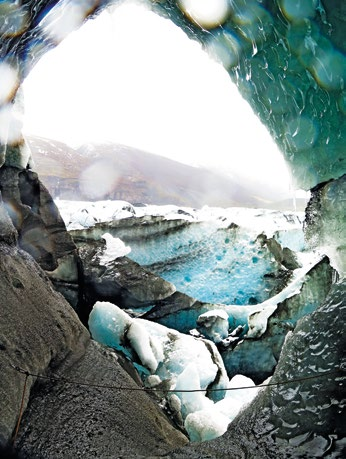 1 An ice formation doubles as a picture frame on Svinafellsjokull glacier.