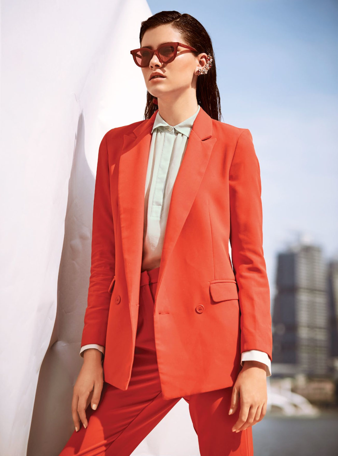 Iris & Ink jacket, $325; and pants, $149, both from THE OUTNET. Blouse, $640, from Longchamp. Sunglasses from Gentle Monster. Ear cuff, $699, from Jason Wu x Atelier Swarovski.